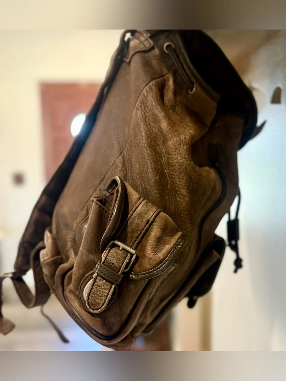 Men's Brown Leather Backpack with Front and Side Pockets
